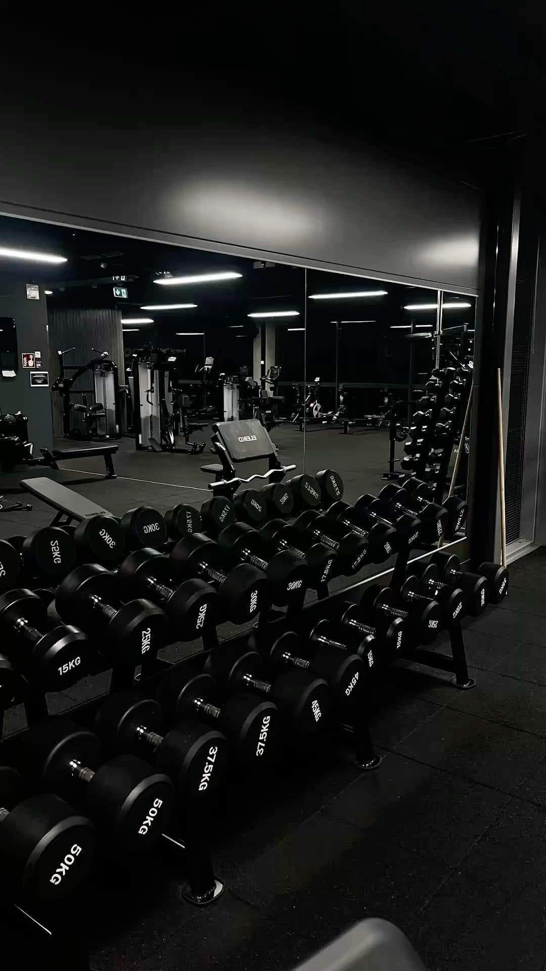 Heavy training in a dim gym, the kind of session that spikes a strain score